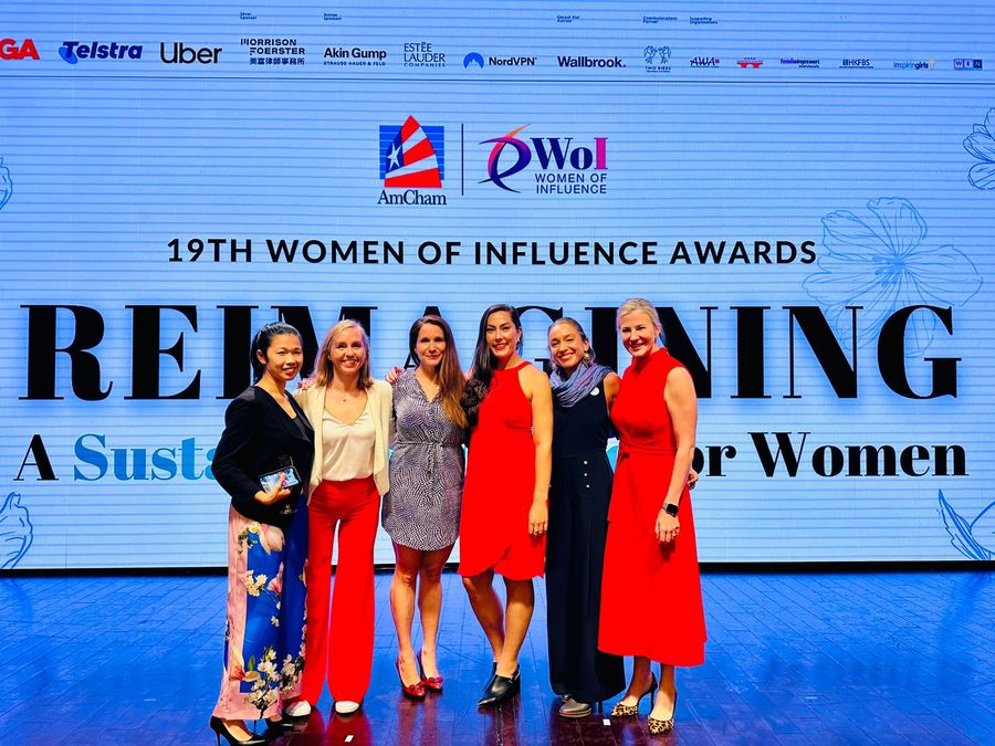 Tammie with other women on stage at the AmCham Women of Influence Awards